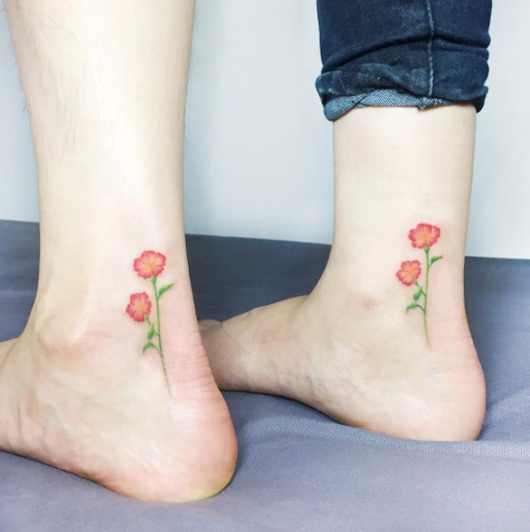 Matching floral ankle tattoo idea for friends.