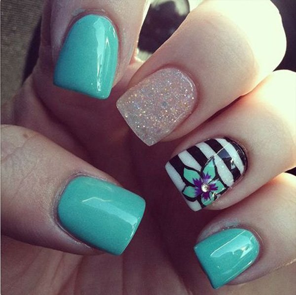 sea-blue-strips-and-flower-nail-design