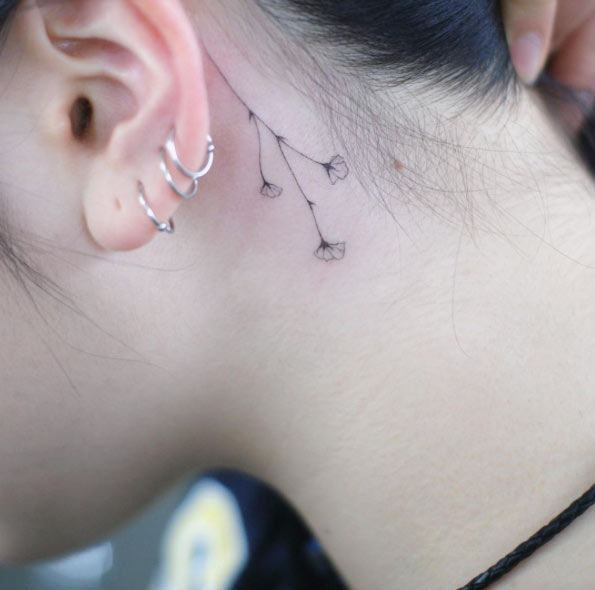 minimalistic-behind-the-ear-tattoo