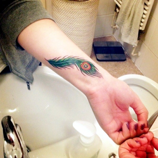 peacock-feather-tattoo-on-the-wrist