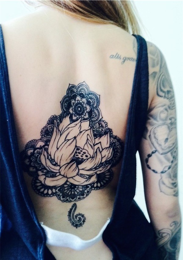 Back piece lotus flower tattoo