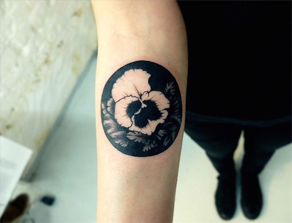 Black and white flower tattoo