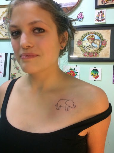 Elephant baby tattoo design on chest ideas for girls.