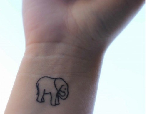 Outline of Elephant Tattoo on Inner Wrist