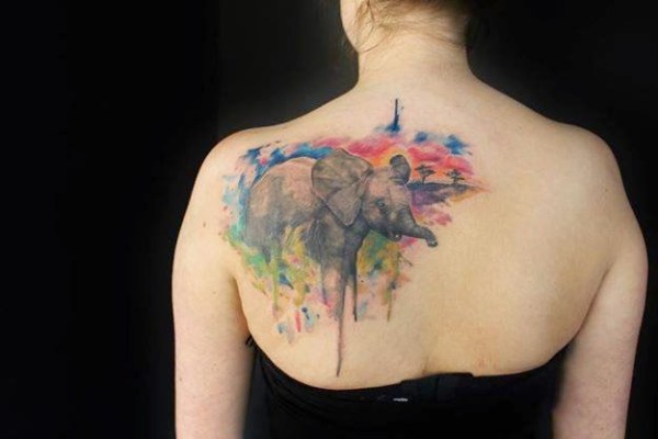 Watercolor Elephant tattoo on upper back designs for women