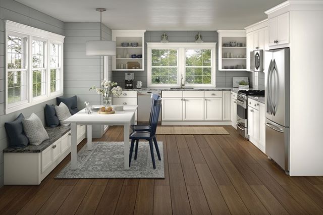 White, Cotton paint creates an open airy space in this Merillat kitchen. When paired with darker neutrals it provides a fresh contrast.