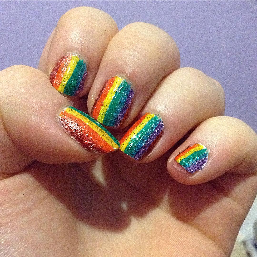 When life gives you colour, paint a rainbow! #nails #nailart #rainbownails #rainbownailart #stripednails #rainbow #colourful #sparkle #sparklynails #sparklynailart #sparkly