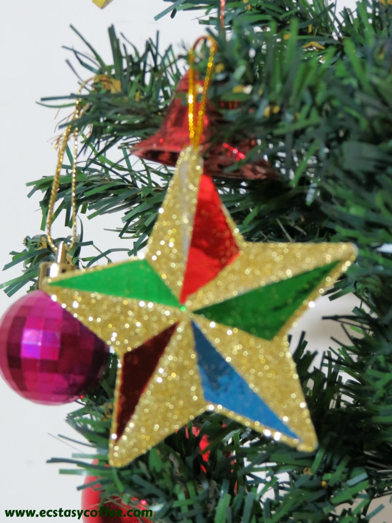 Christmas ornaments with glittering balls and stars.