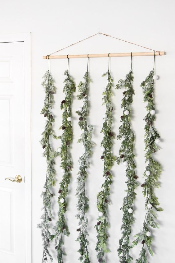 Simple holiday garland backdrop. Perfect as a photobooth backdrop or behind a dessert table.