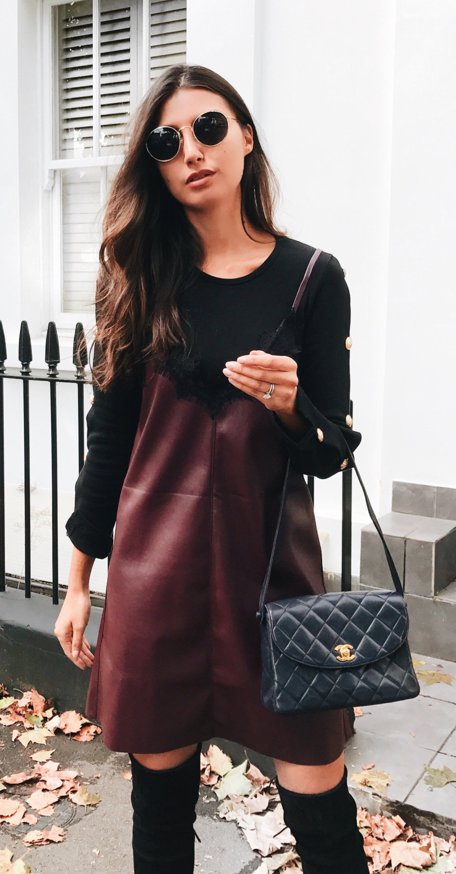 women's black and brown long sleeve dress and sling bag