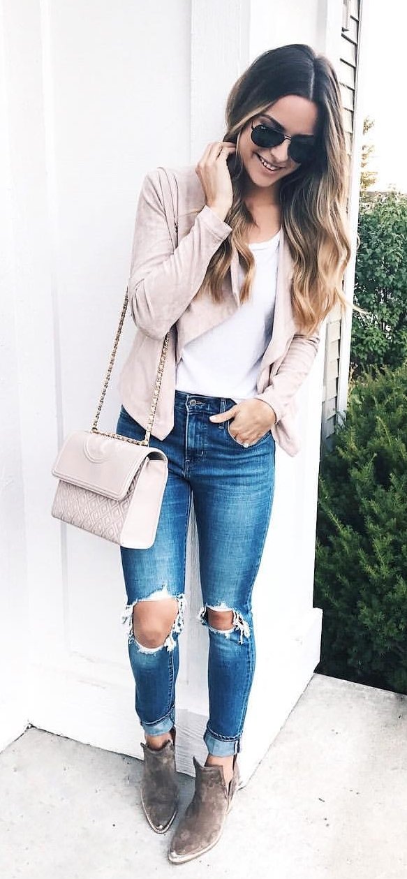 women's white top, beige cardigan, distressed jeans, and brown booties outfit