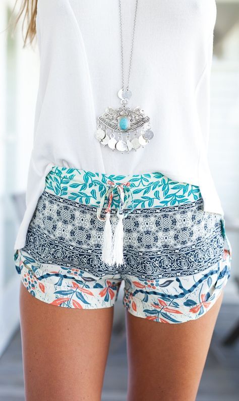 Romantic look for this summer. Chiffon colorful shorts and white skirt.