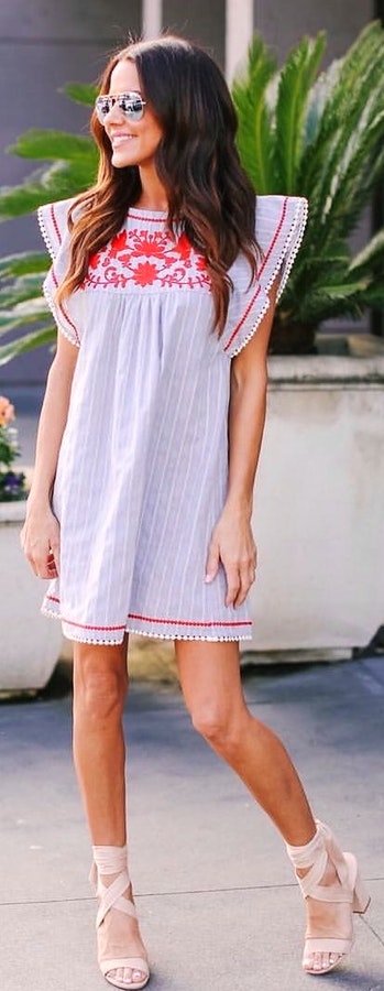 white and red sleeveless dress.