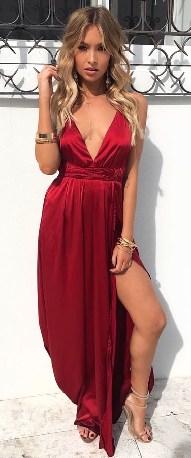 Red velvet plunging neckline single slit dress