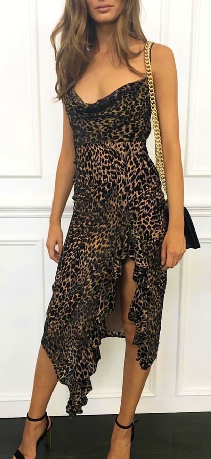 Black and brown animal printed tube side-slit dress.