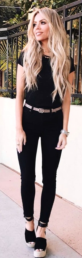 Black pants and top with pink belt