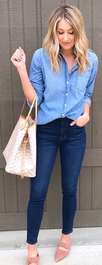 Blue dress shirt, blue denim with brown pump.