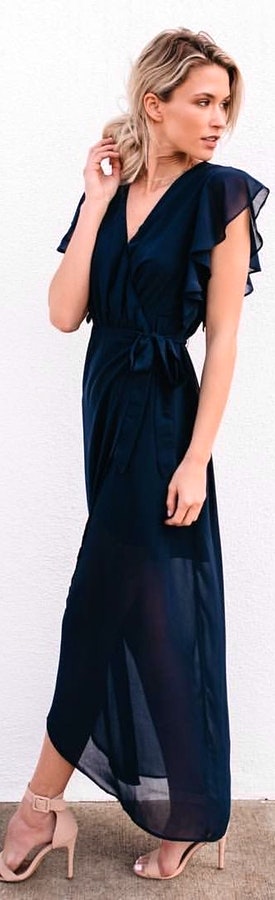 Blue maxi dress with high heels.