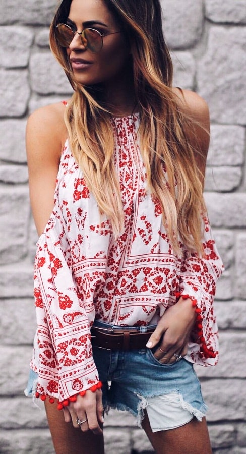 Tribal-pattern off-shoulder blouse with denim short.