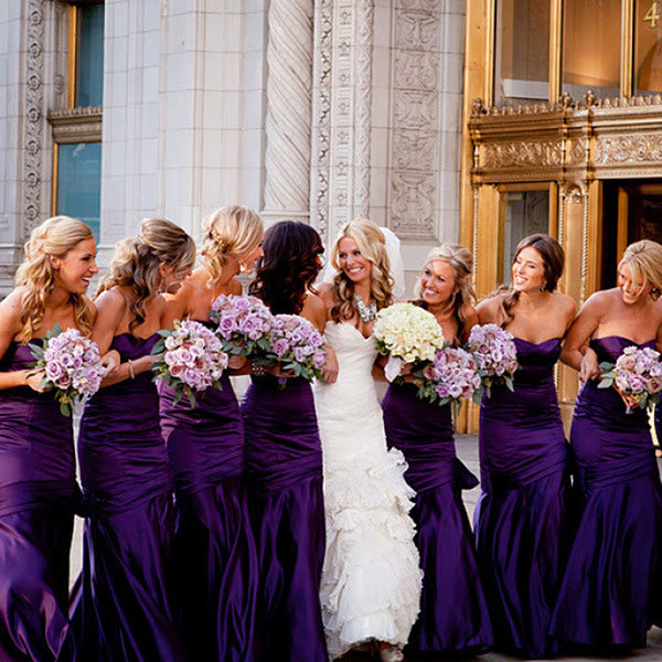 Go monochromatic with a plum jewel tone and pair it with a lighter shade of bouquets.