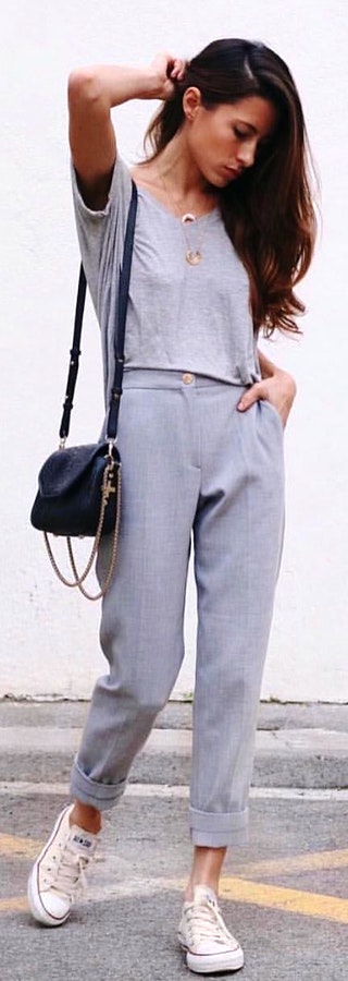 Grey v-neck shirt and jagger pants.