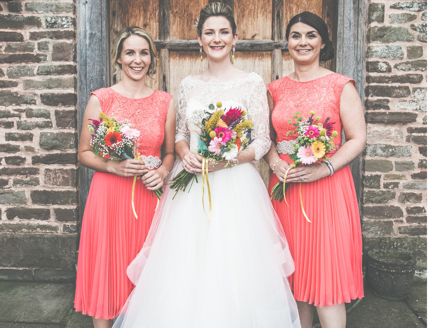 Joanne's bridesmaids were pretty in salmon pink