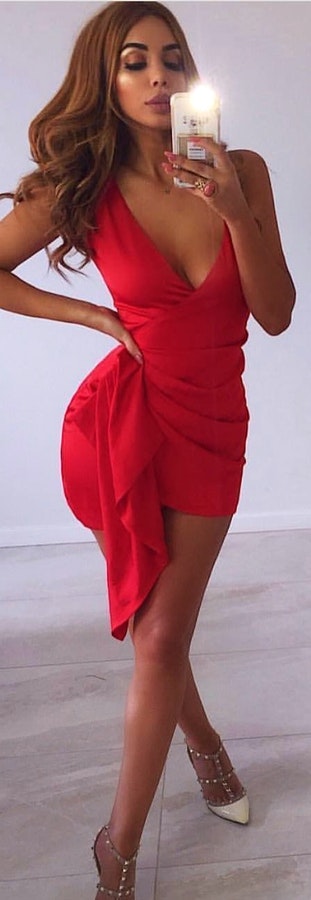 Red plunging neckline dress.