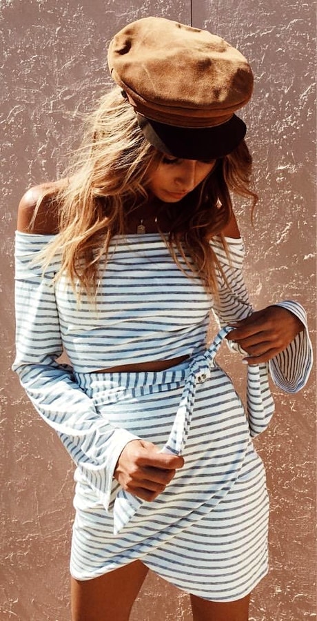 White and black striped two-piece off-shoulder dress.