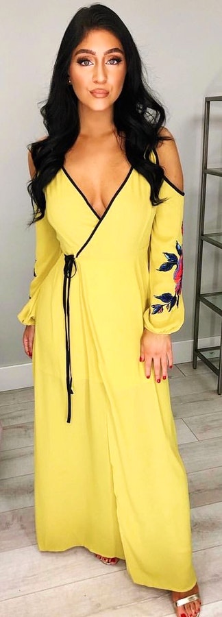 Yellow deep v-neck cold-shoulder dress.