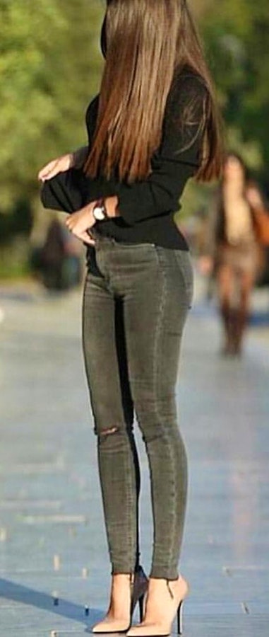 women's black crew-neck long-sleeved shirt with black denim fitted jeans.