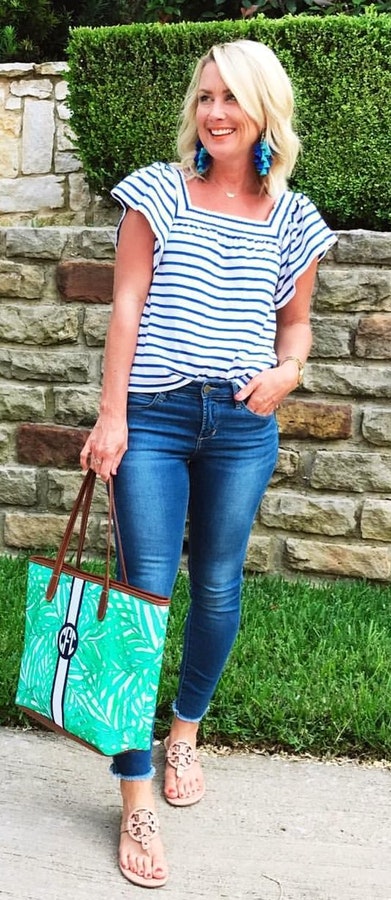 women's blue-and-white square-neck stripe cap-sleeve blouse; blue denim stone-wash fitted jeans.