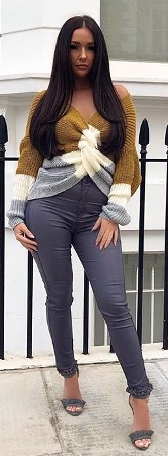 Brown, white, and grey knitted sweater.