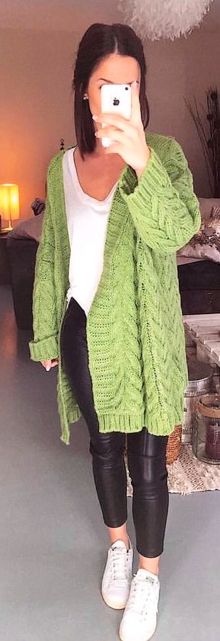 Green knitted sweater.