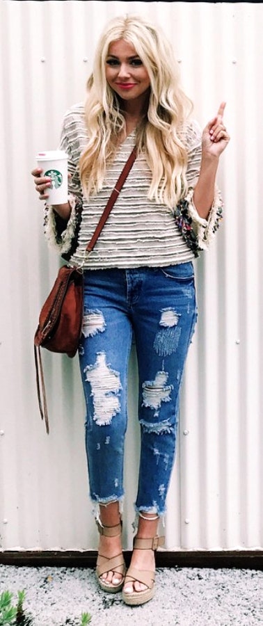 Striped Knit & Ripped Skinny Jeans & Brown Leather Shoulder Bag.