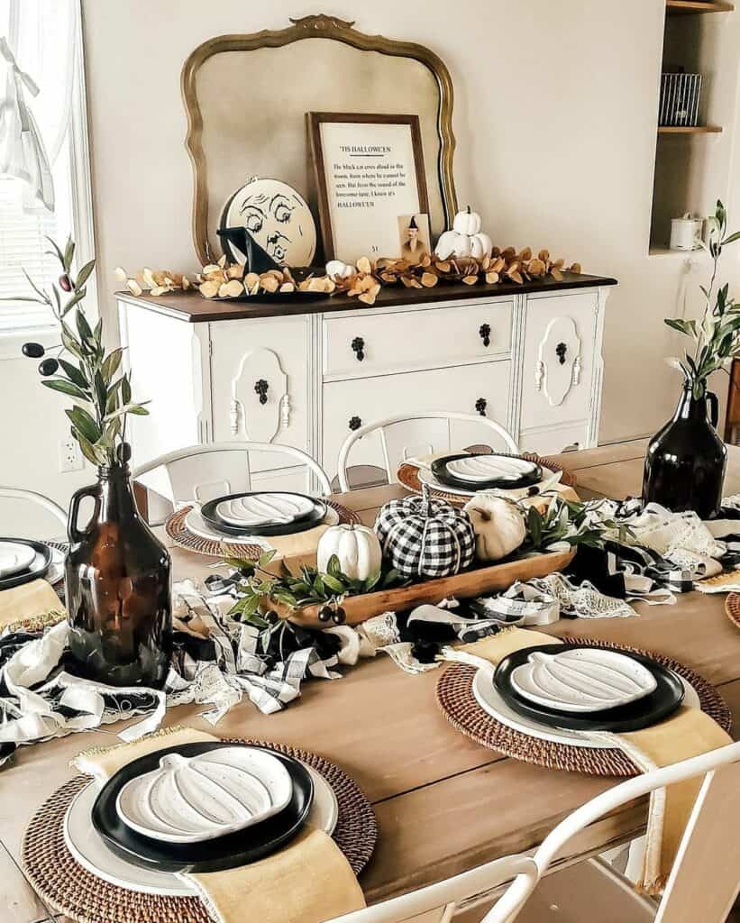 Thanksgiving Tablescape in Navy, Burgundy, and Gold.