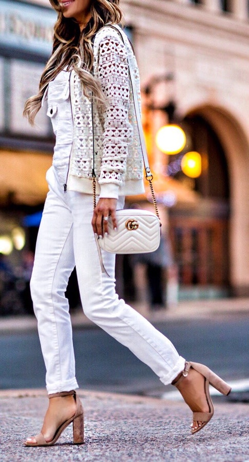 White Printed Jacket & White Jeans & Nude Sandals.