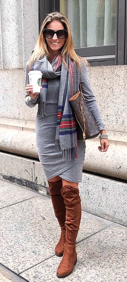 Women's gray cowl neckline long-sleeve midi dress and brown leather knee-high boots outfit.