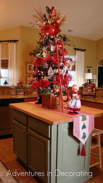 Christmas kitchen, love the decorations in glass in the back of this shot.