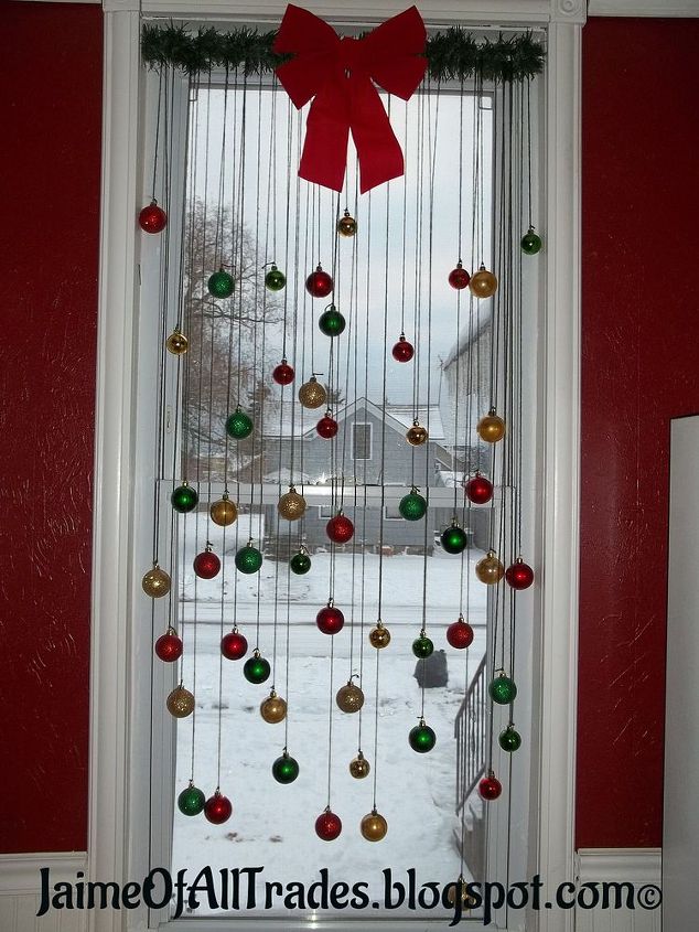 Decorate your windows using the Christmas baubles.