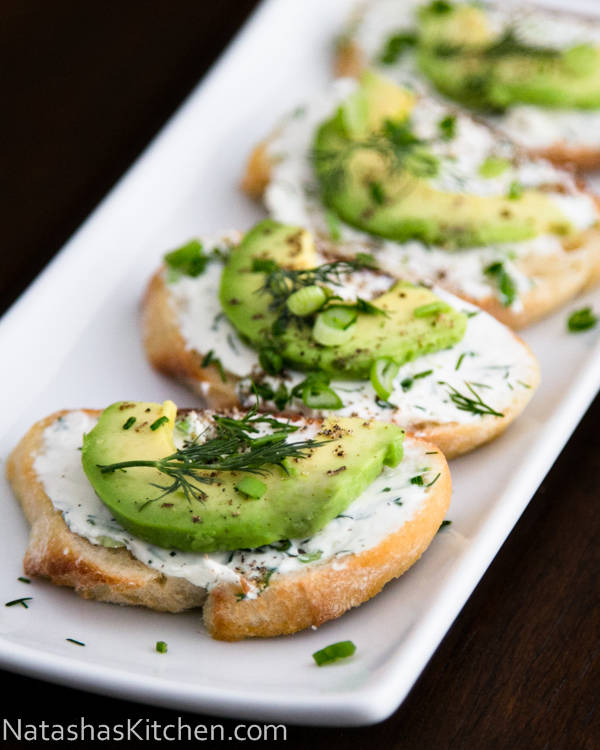 Canapes with Garlic Herb Cream Cheese and Avocado.