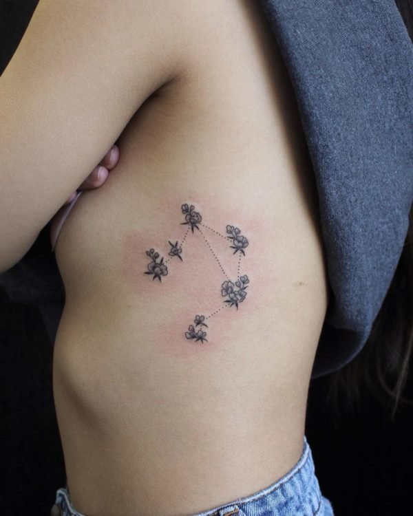 Flower Constellation Side Tattoo.