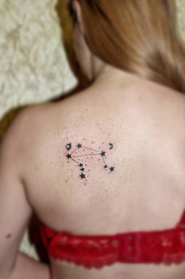 Libra Constellation and Galaxy Shoulder Blade Tattoo.