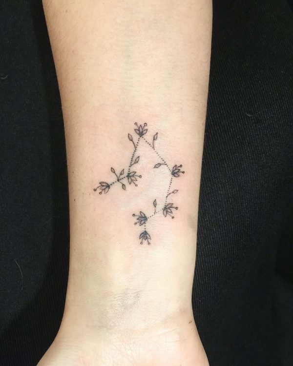 Libra Flower Constellation Wrist Tattoo.