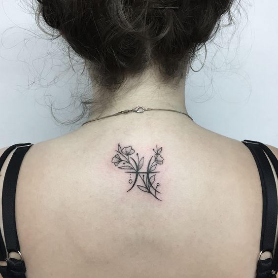 Pisces Back Tattoo.