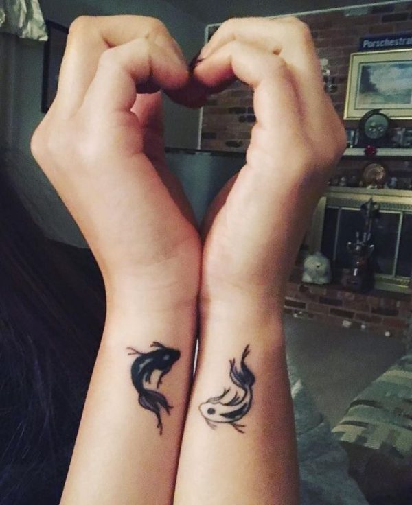 Pisces Fish Two Wrist Tattoo.