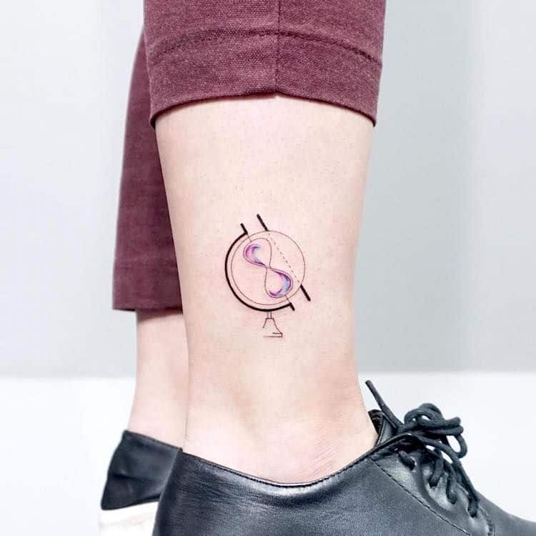 Sandglass Libra tattoo above the ankle.