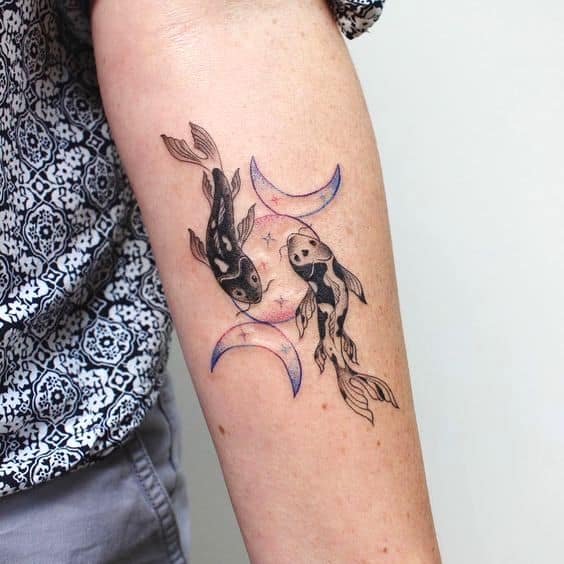 Sophisticated lunar zodiac tattoo on the arm.