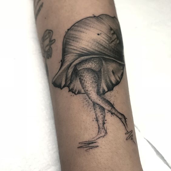 The hidden crab Cancer arm tattoo.