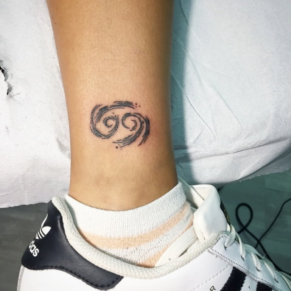 Zodiac Cancer Symbol Ankle Tattoo.