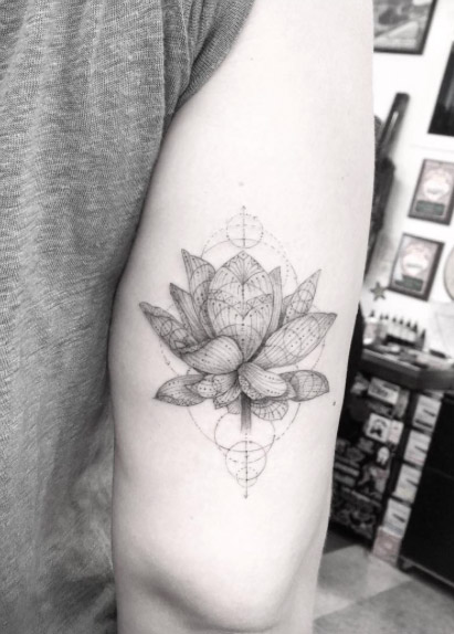 Amazing lotus flower on back arm.